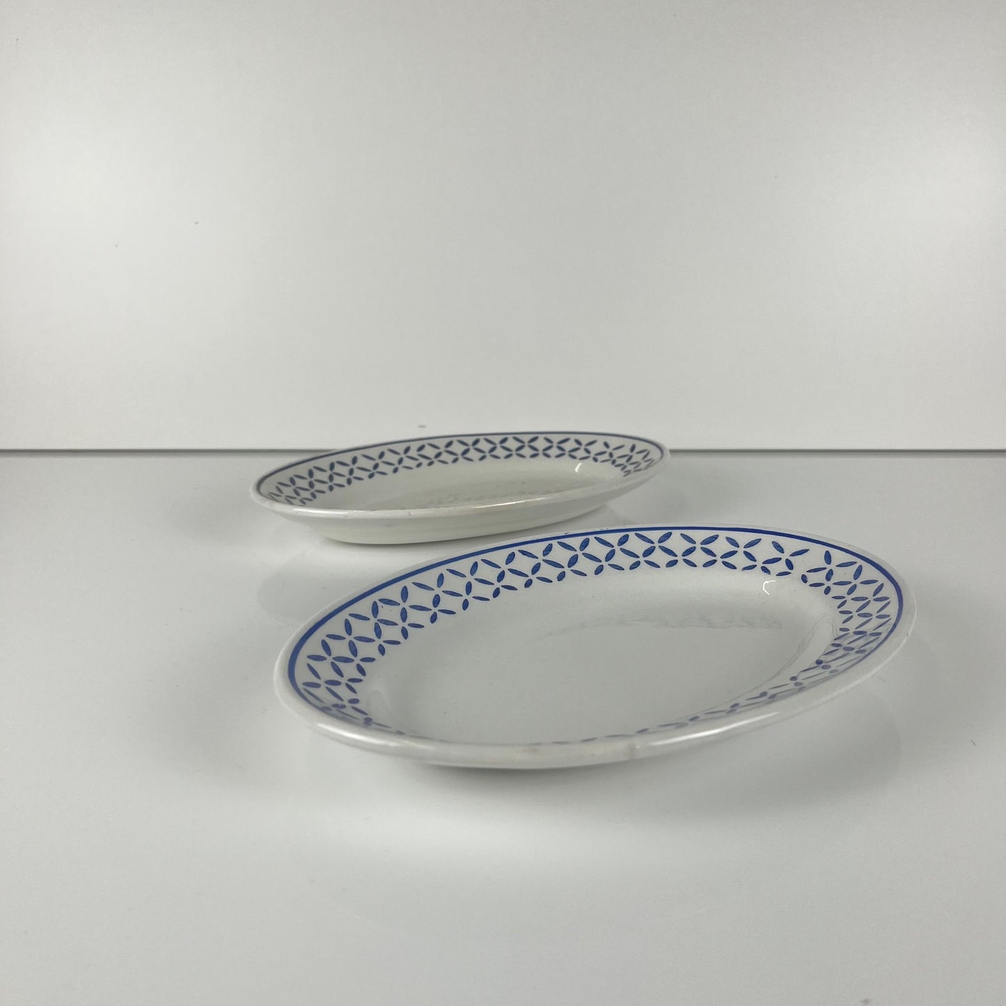 Pair of Ravier KG Lunéville plates, "Kleber" model, mid-20th century