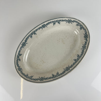 Plat ovale terre de fer modele "Lauriers" par Moulins des loups - Hamage, 1900