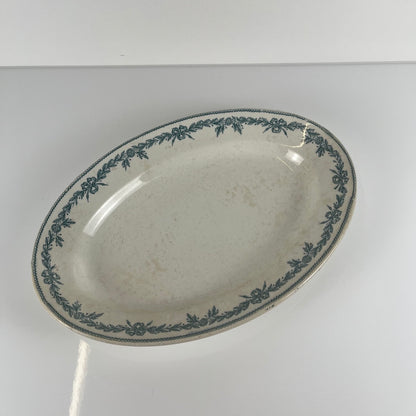 Plat ovale terre de fer modele "Lauriers" par Moulins des loups - Hamage, 1900
