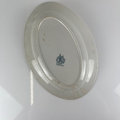 Plat ovale terre de fer modele "Lauriers" par Moulins des loups - Hamage, 1900