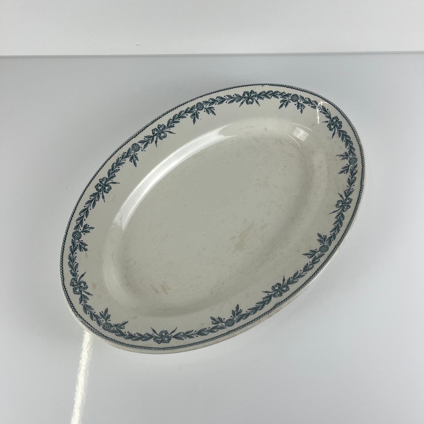 Large ironstone oval dish, "Lauriers" pattern by Moulins des loups - Hamage, 1900