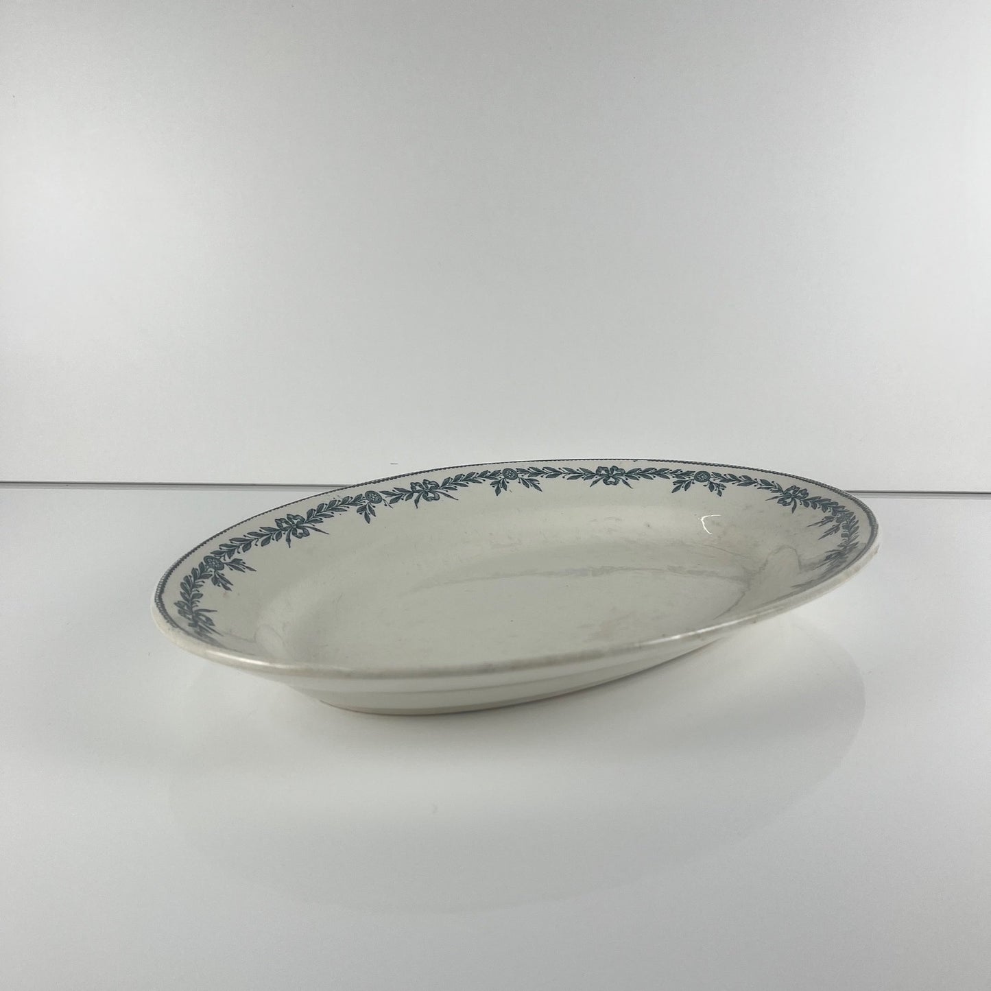 Large ironstone oval dish, "Lauriers" pattern by Moulins des loups - Hamage, 1900