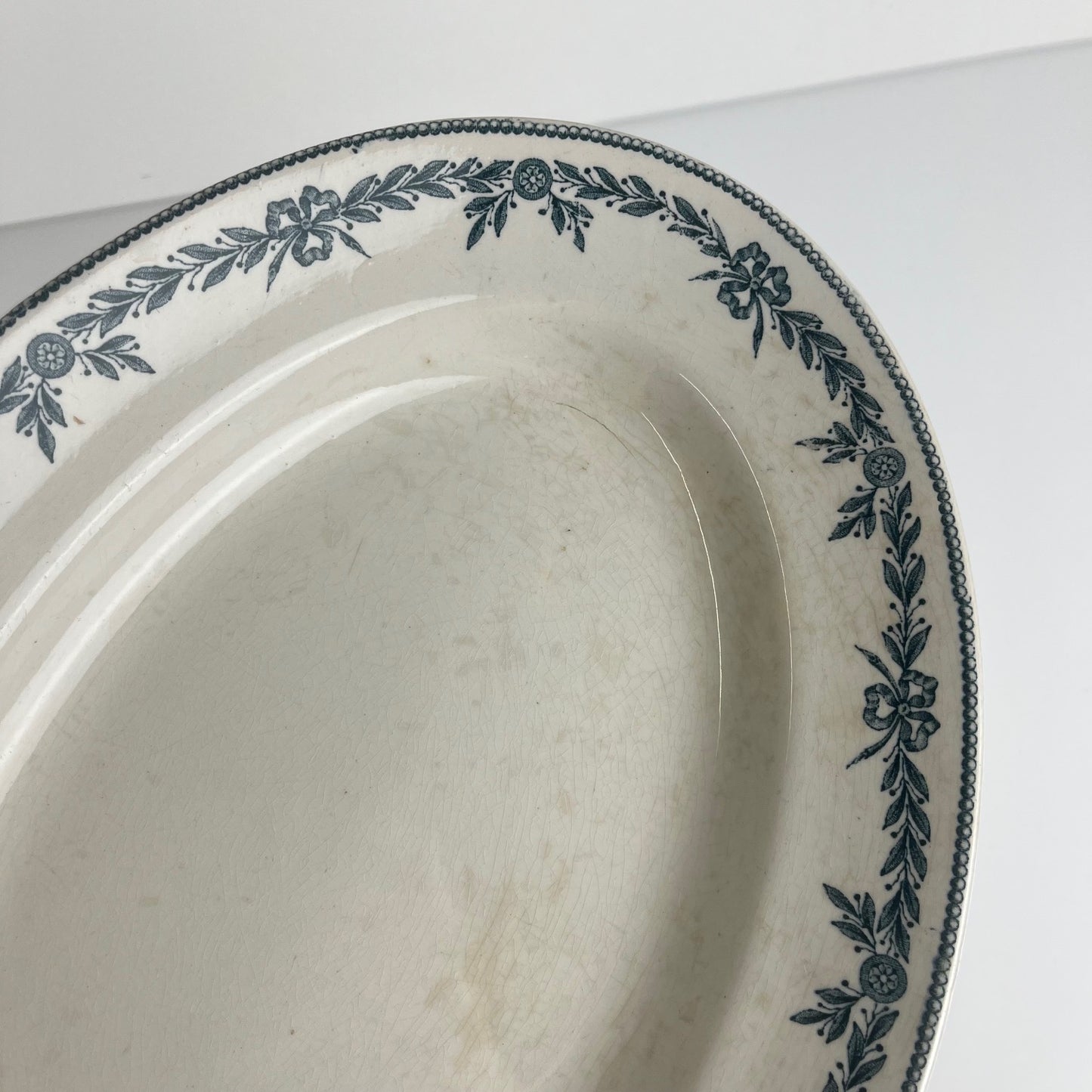 Large ironstone oval dish, "Lauriers" pattern by Moulins des loups - Hamage, 1900