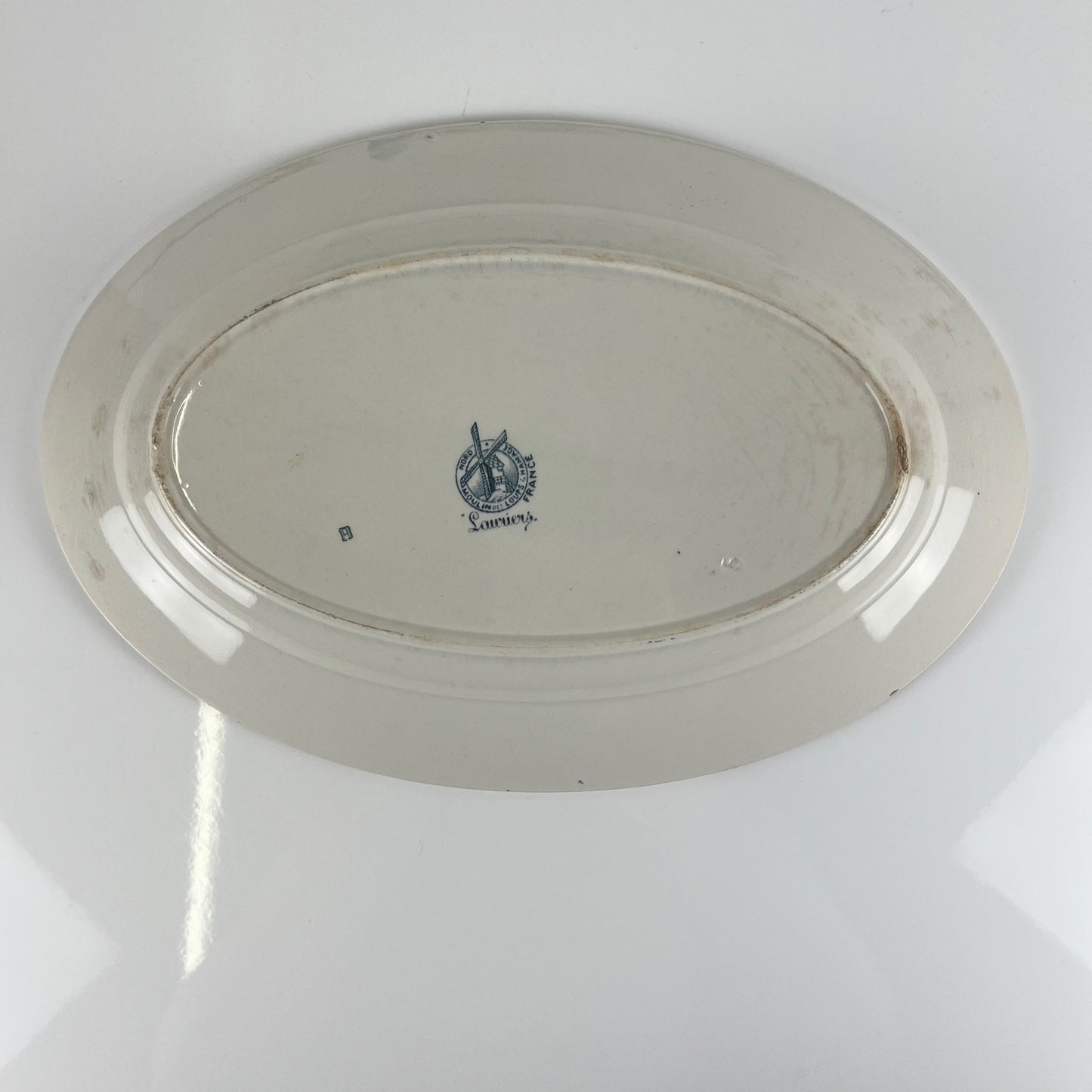 Large ironstone oval dish, "Lauriers" pattern by Moulins des loups - Hamage, 1900