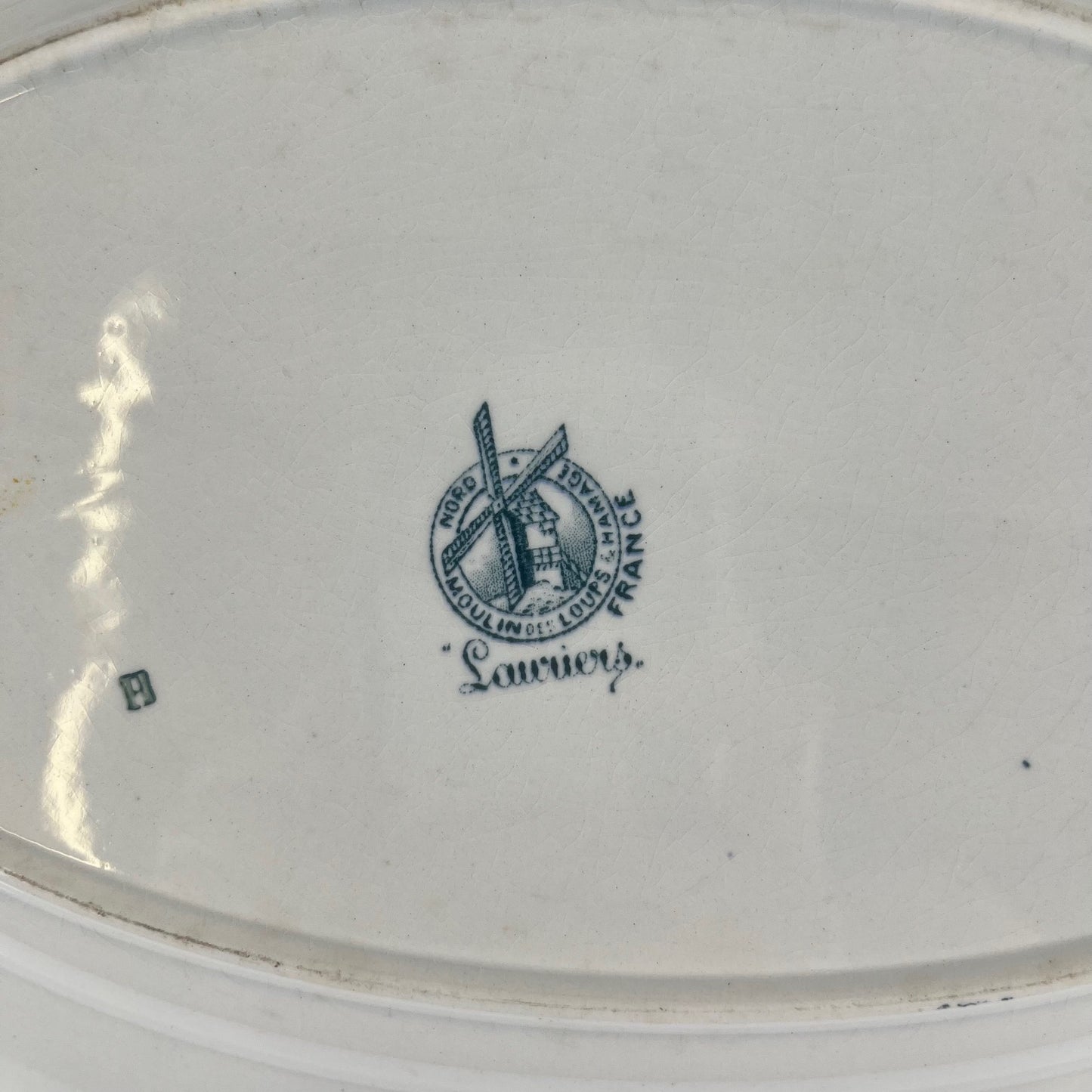 Large ironstone oval dish, "Lauriers" pattern by Moulins des loups - Hamage, 1900
