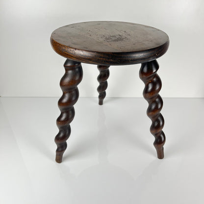 Antique solid wood stool with twisted legs, early 20th century
