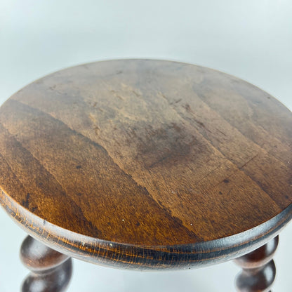 Antique solid wood stool with twisted legs, early 20th century
