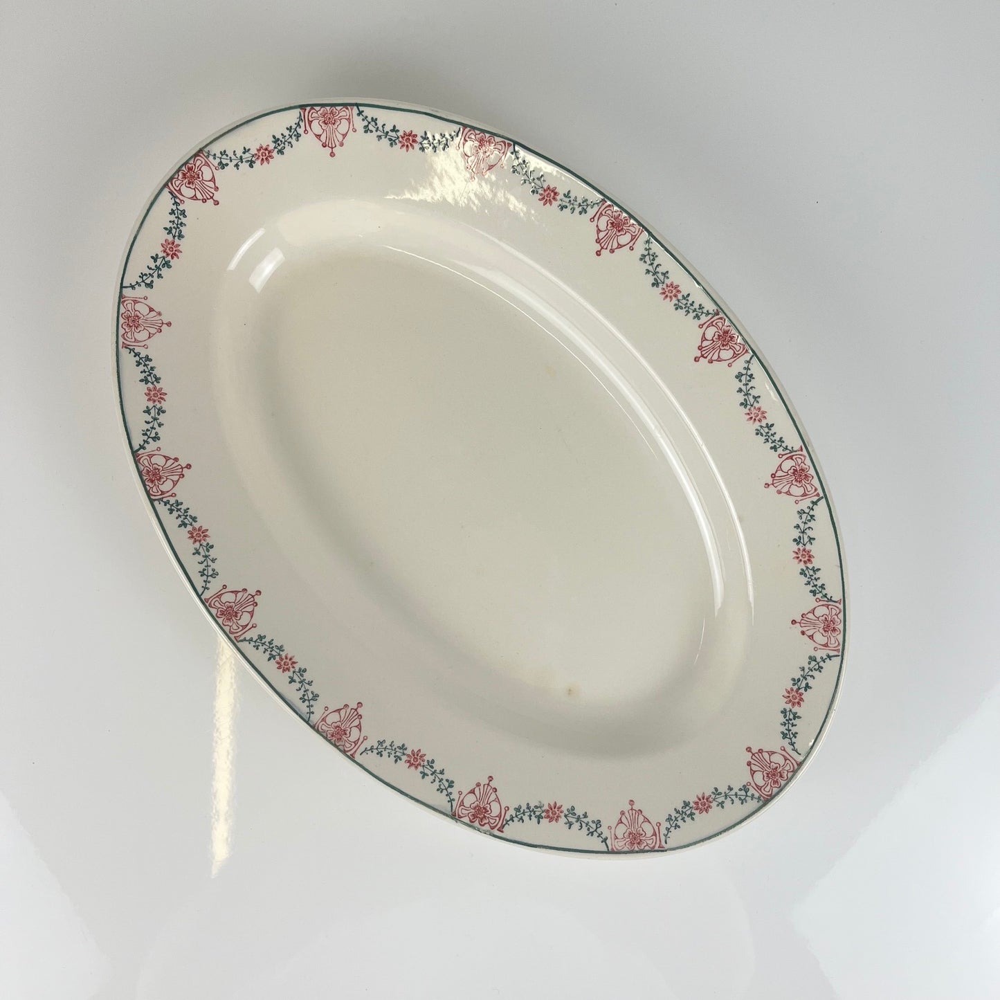 Longwy oval dish, pink and green garland pattern, early 20th century.