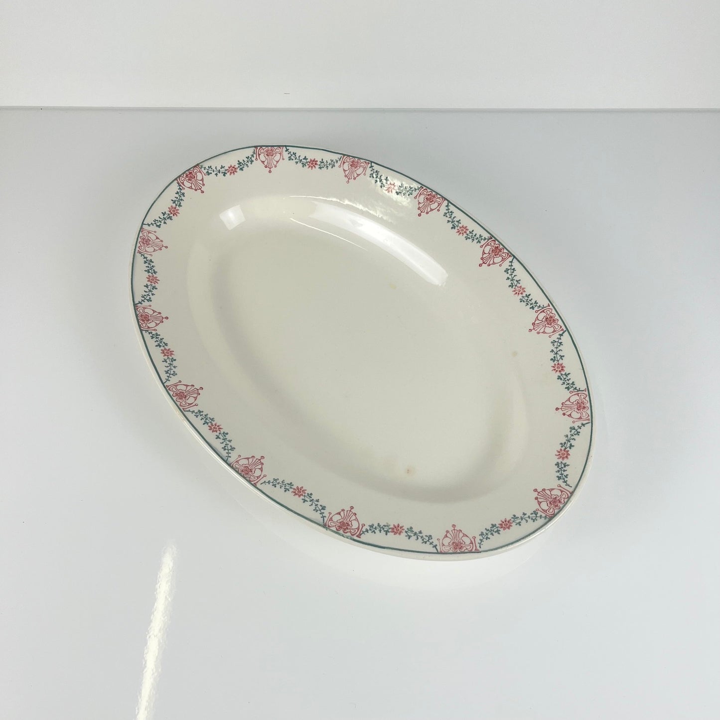 Longwy oval dish, pink and green garland pattern, early 20th century.