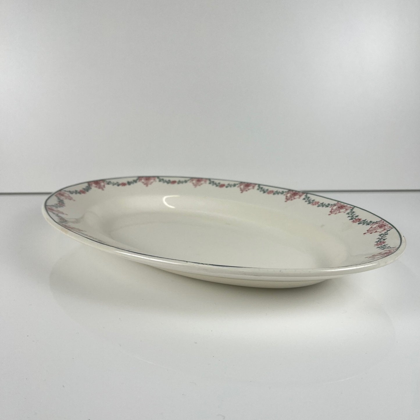 Longwy oval dish, pink and green garland pattern, early 20th century.