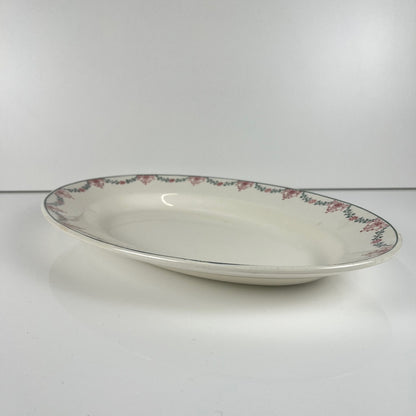 Longwy oval dish, pink and green garland pattern, early 20th century.