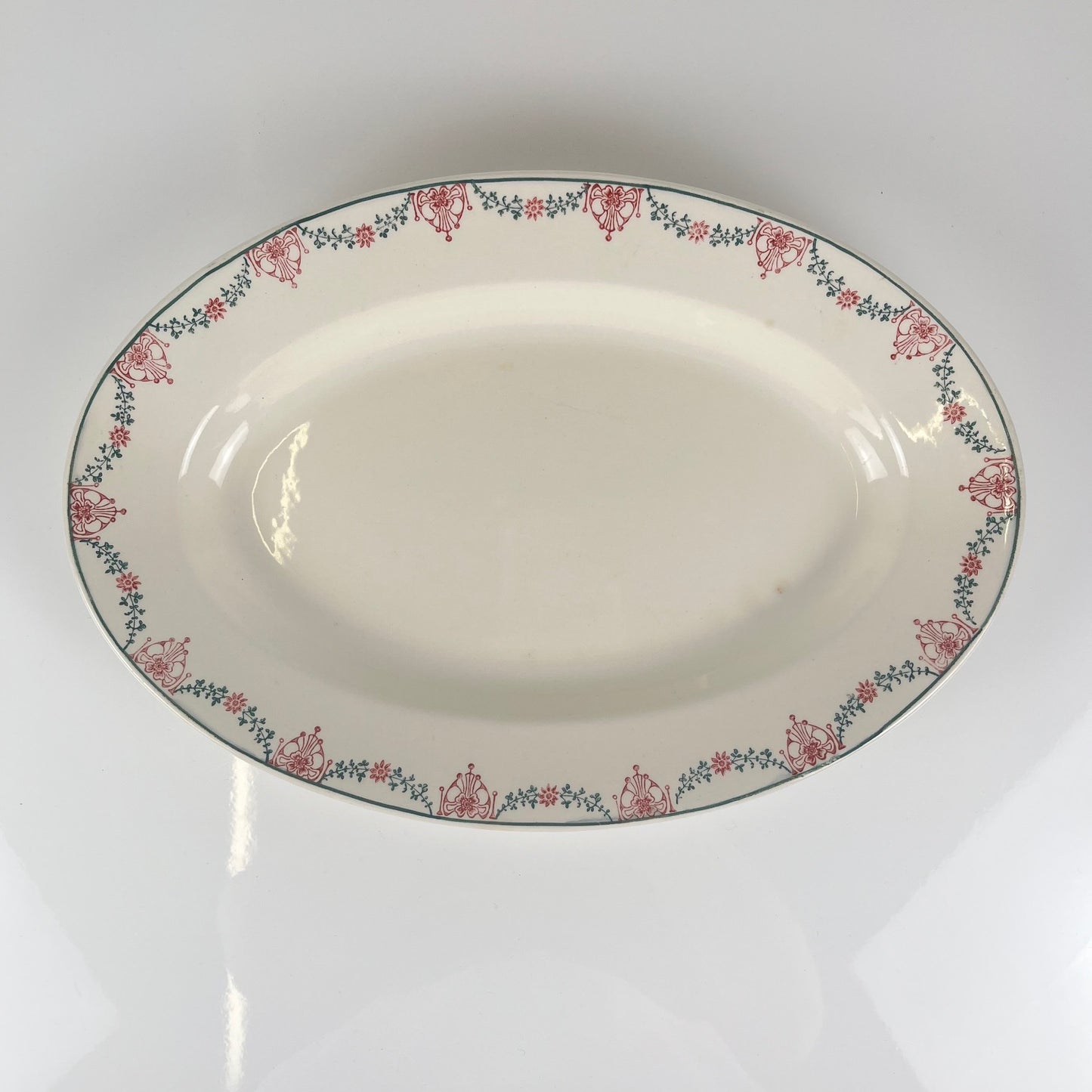 Longwy oval dish, pink and green garland pattern, early 20th century.