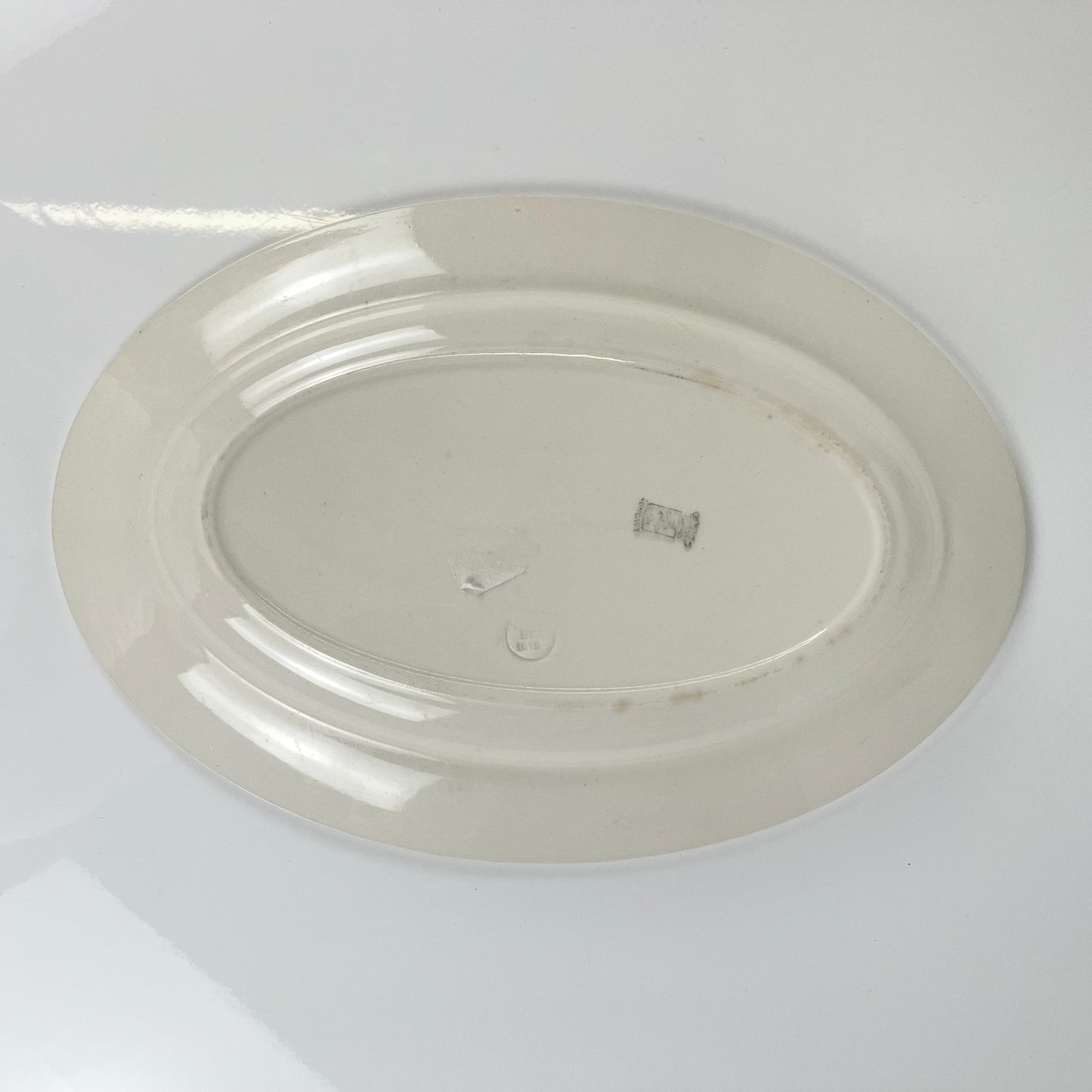 Longwy oval dish, pink and green garland pattern, early 20th century.