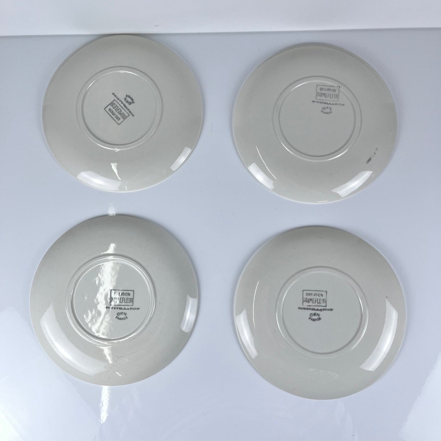 Set de 4 assiettes à dessert GIEN, Création Primefleur, modele "Constellation" , 1950