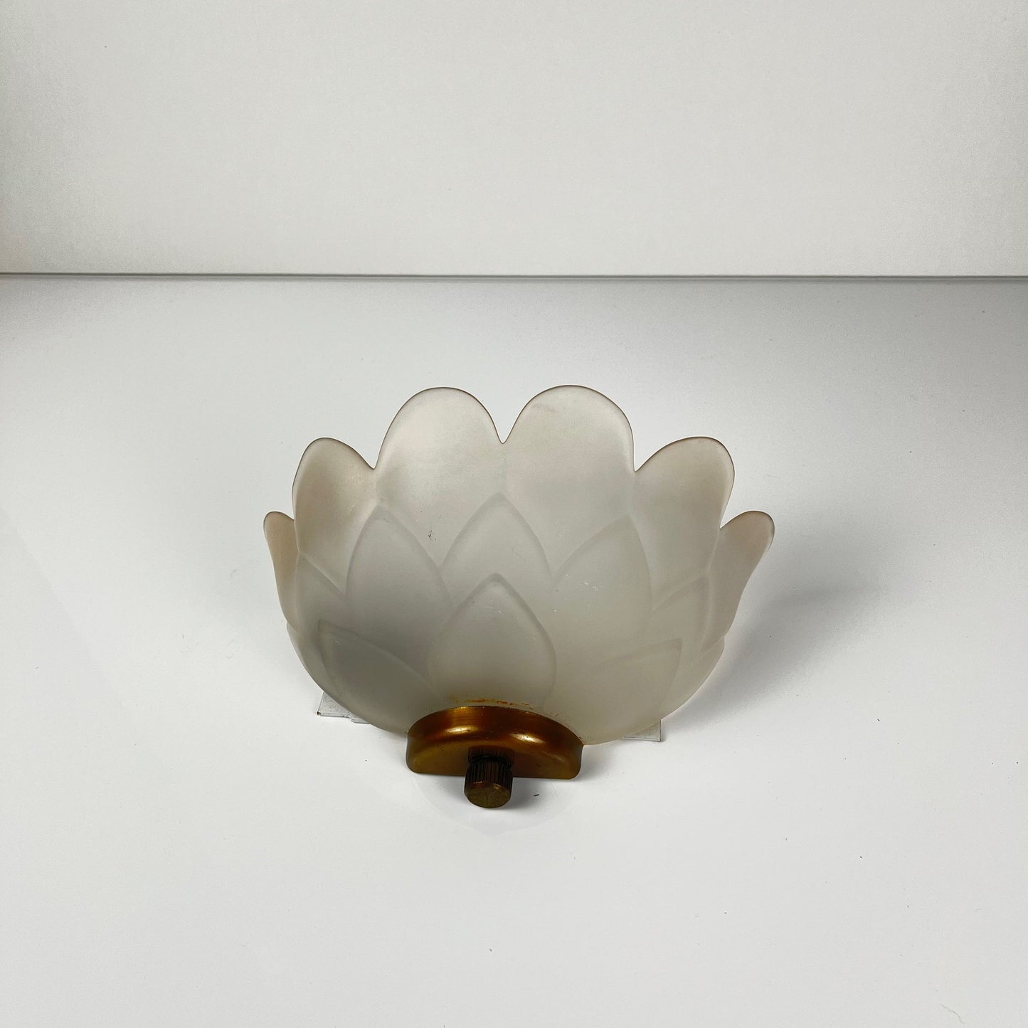 Trio of vintage frosted glass and brass wall sconces