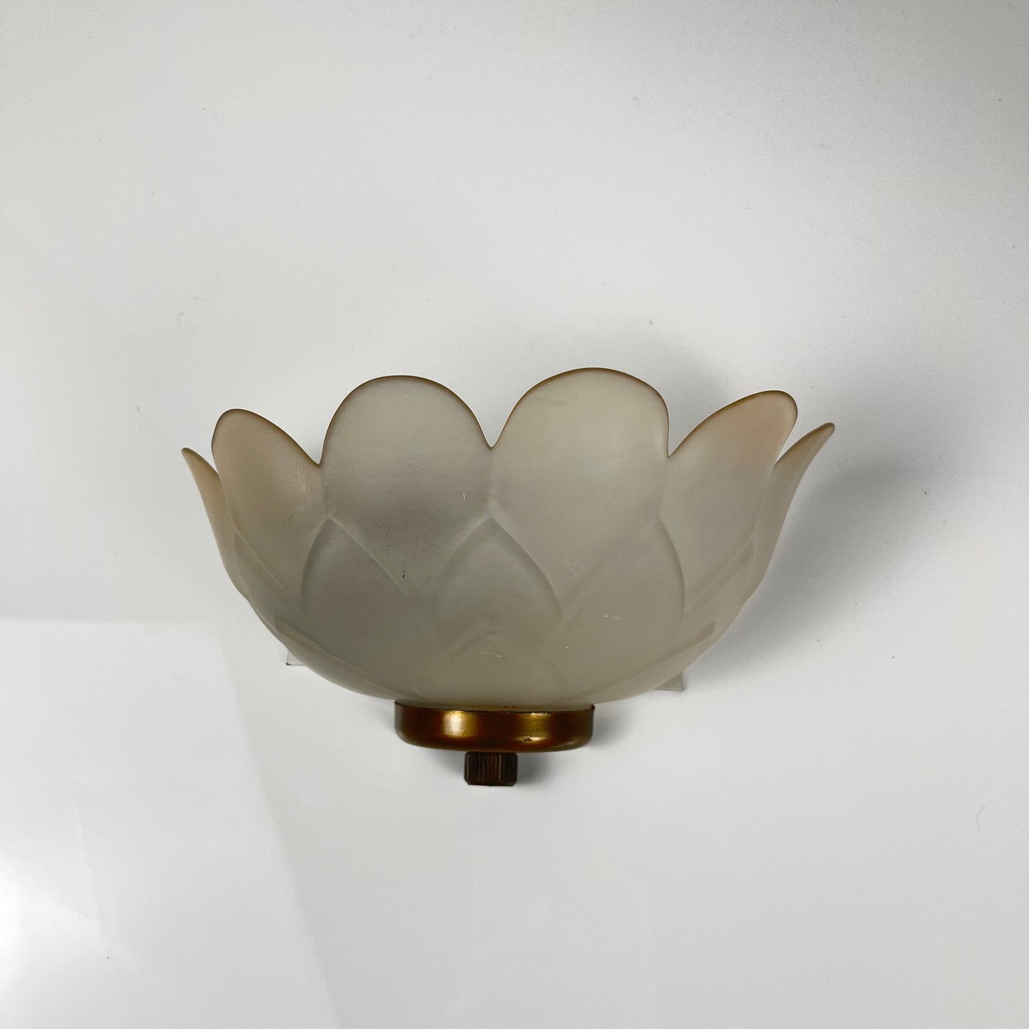 Trio of vintage frosted glass and brass wall sconces