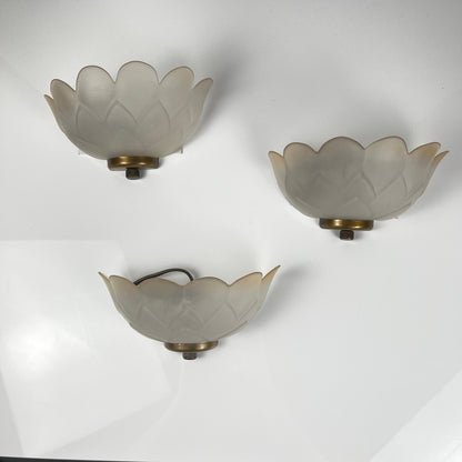 Trio of vintage frosted glass and brass wall sconces