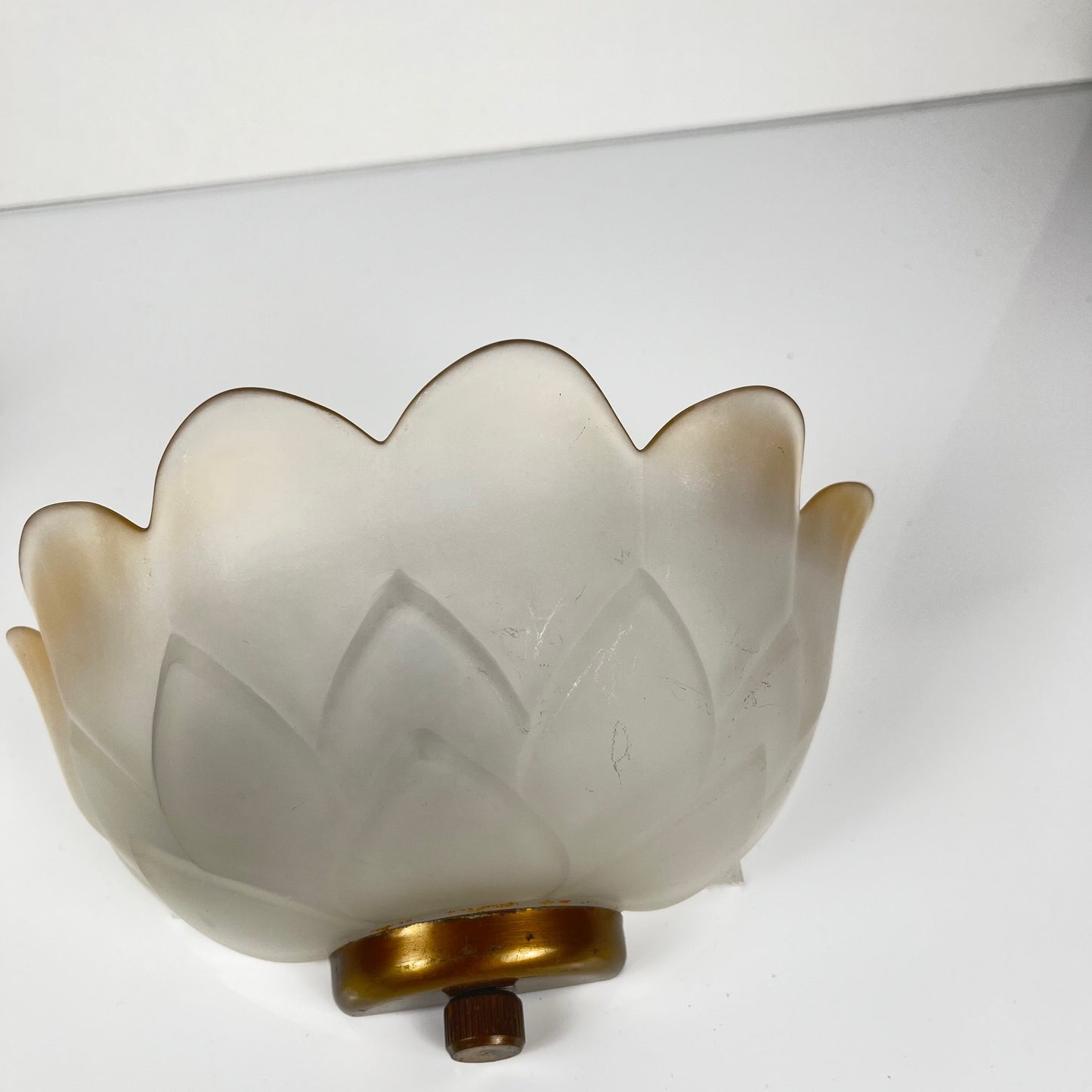 Trio of vintage frosted glass and brass wall sconces