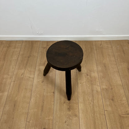 Small brutalist tripod stool in solid wood