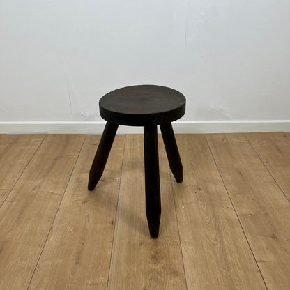 Small brutalist tripod stool in solid wood