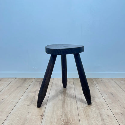 Small brutalist tripod stool in solid wood