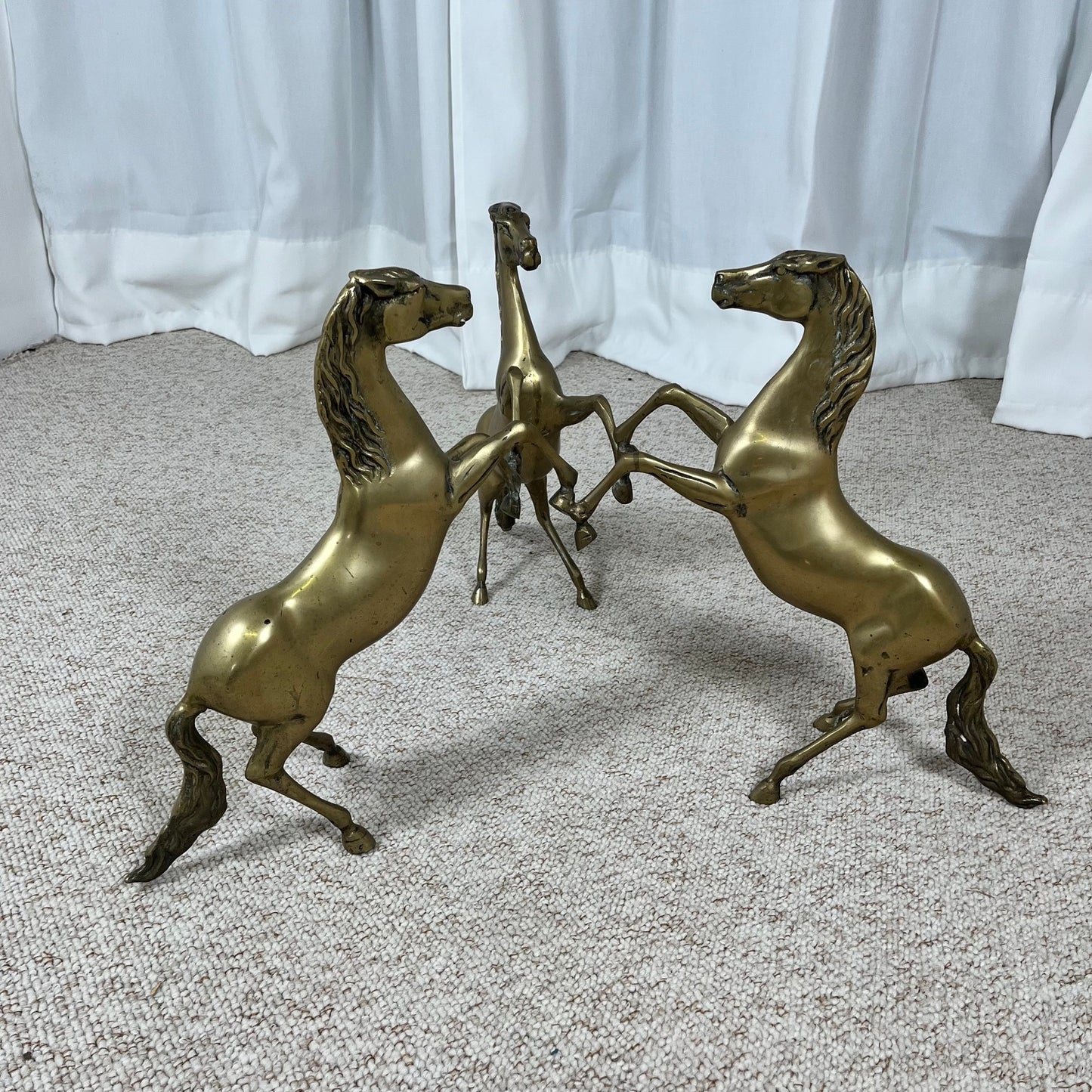 Hollywood Regency style coffee table, 6 patinated brass horses & glass top, 1970