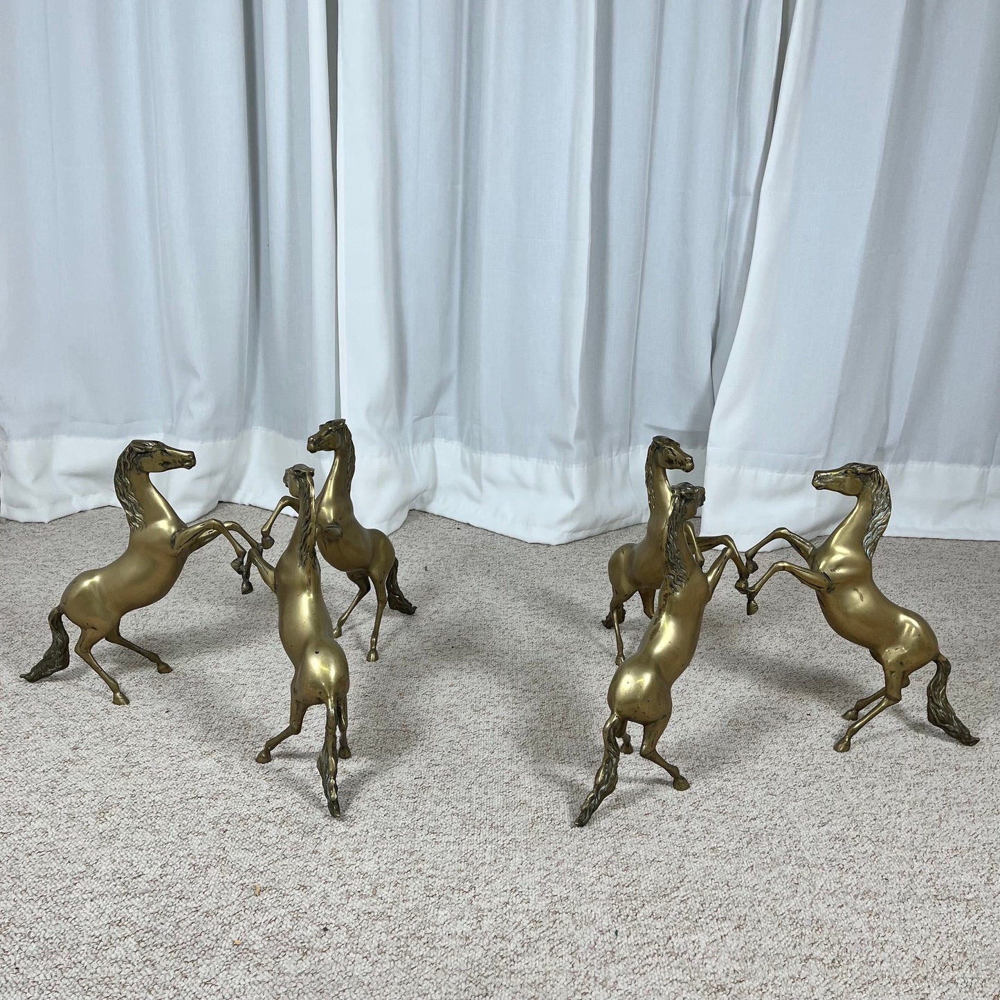 Hollywood Regency style coffee table, 6 patinated brass horses & glass top, 1970