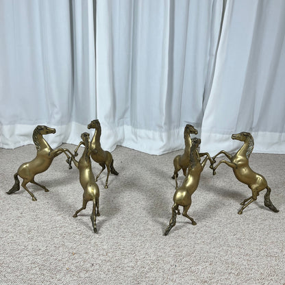 Hollywood Regency style coffee table, 6 patinated brass horses & glass top, 1970