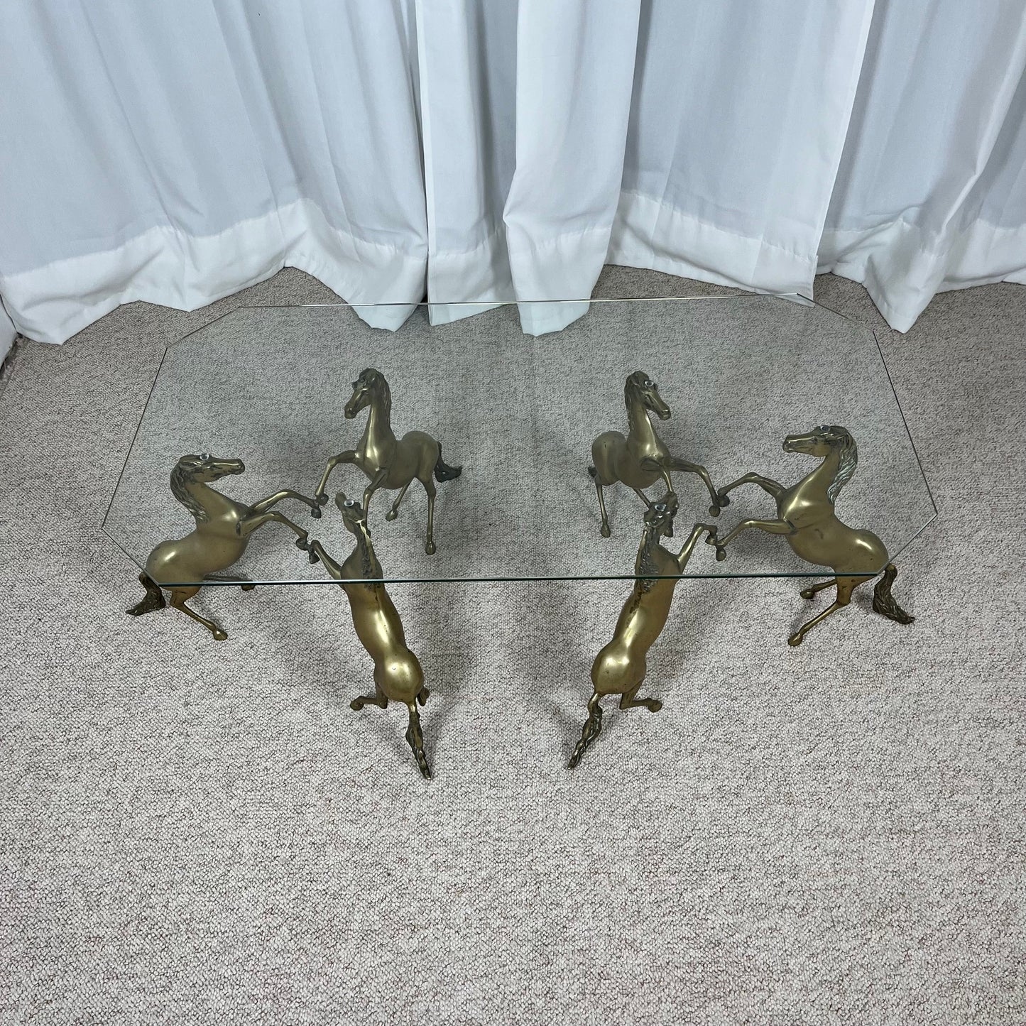 Hollywood Regency style coffee table, 6 patinated brass horses & glass top, 1970