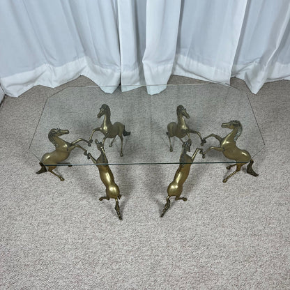 Hollywood Regency style coffee table, 6 patinated brass horses & glass top, 1970