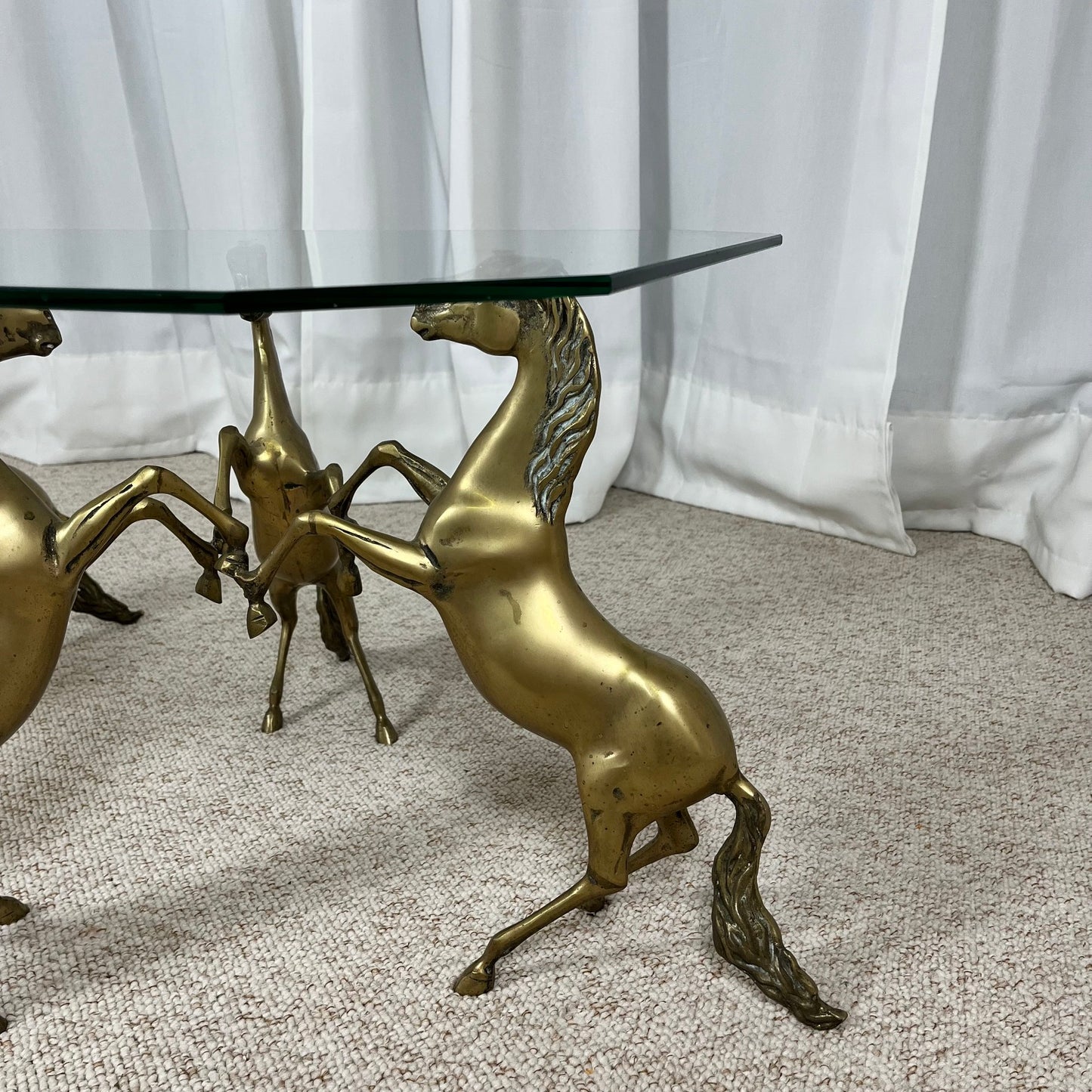 Hollywood Regency style coffee table, 6 patinated brass horses & glass top, 1970