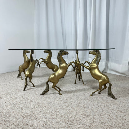 Hollywood Regency style coffee table, 6 patinated brass horses & glass top, 1970