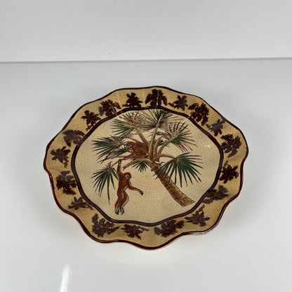 Crackleware plate with an exotic motif of monkeys and palm trees, First half of the 20th century.