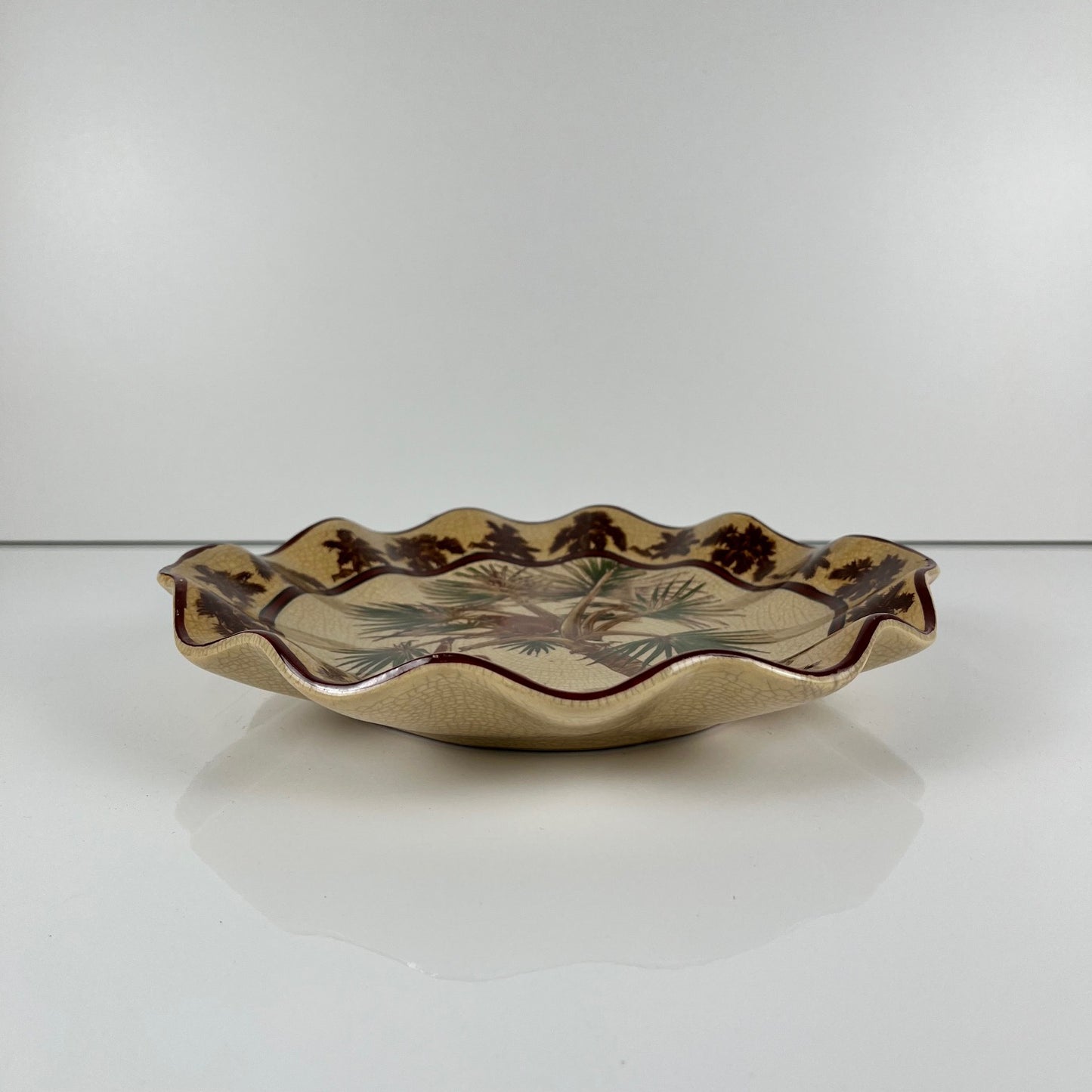 Crackleware plate with an exotic motif of monkeys and palm trees, First half of the 20th century.
