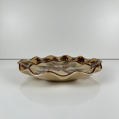 Crackleware plate with an exotic motif of monkeys and palm trees, First half of the 20th century.