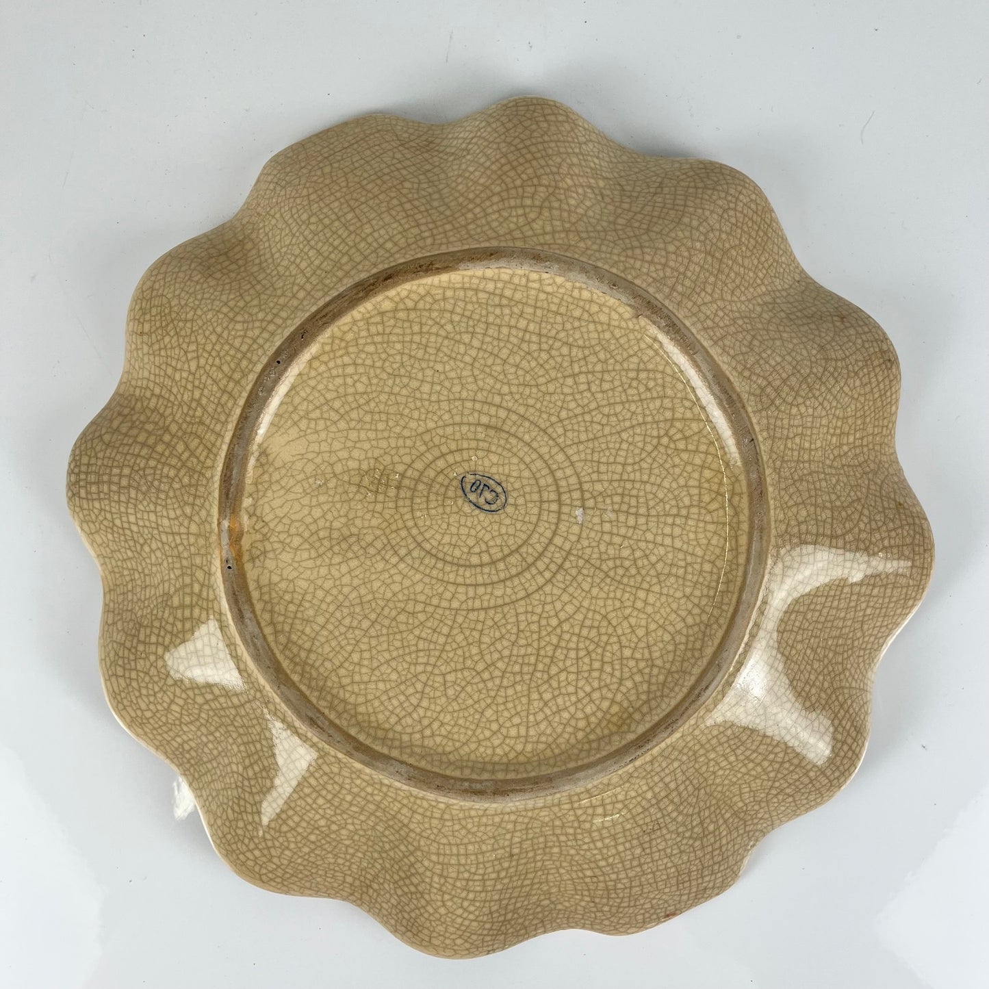 Crackleware plate with an exotic motif of monkeys and palm trees, First half of the 20th century.