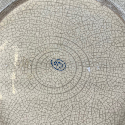 Crackleware plate with an exotic motif of monkeys and palm trees, First half of the 20th century.