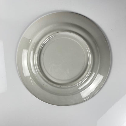 Plat ancien en faïence bleue, décor floral et oiseaux, début XXe