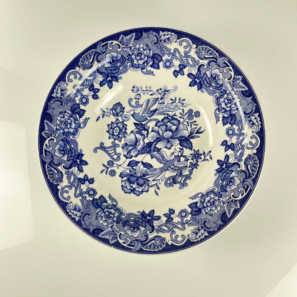 Saladier en faïence bleue, décor floral et oiseaux, début XXe
