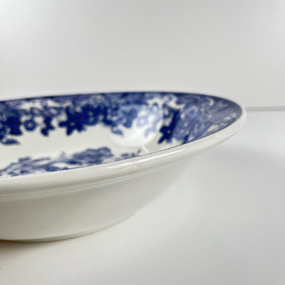 Saladier en faïence bleue, décor floral et oiseaux, début XXe