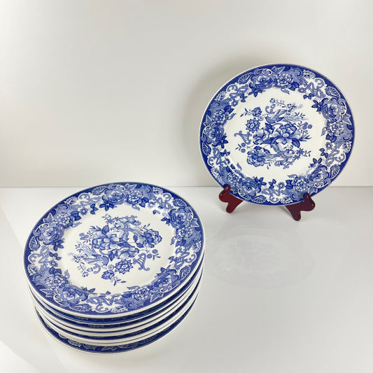 Set of 8 blue earthenware dinner plates with floral and bird decoration, early 20th century
