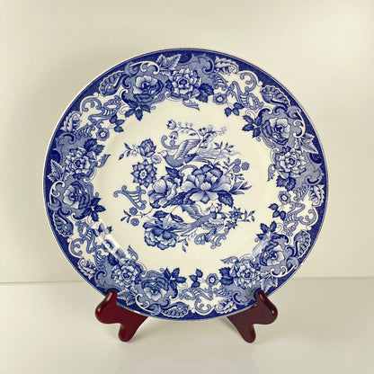 Set of 8 blue earthenware dinner plates with floral and bird decoration, early 20th century