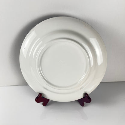 Set of 8 blue earthenware dinner plates with floral and bird decoration, early 20th century
