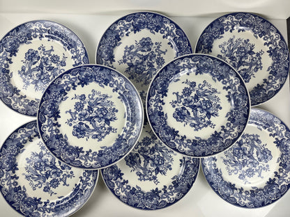 Set of 8 blue earthenware dinner plates with floral and bird decoration, early 20th century
