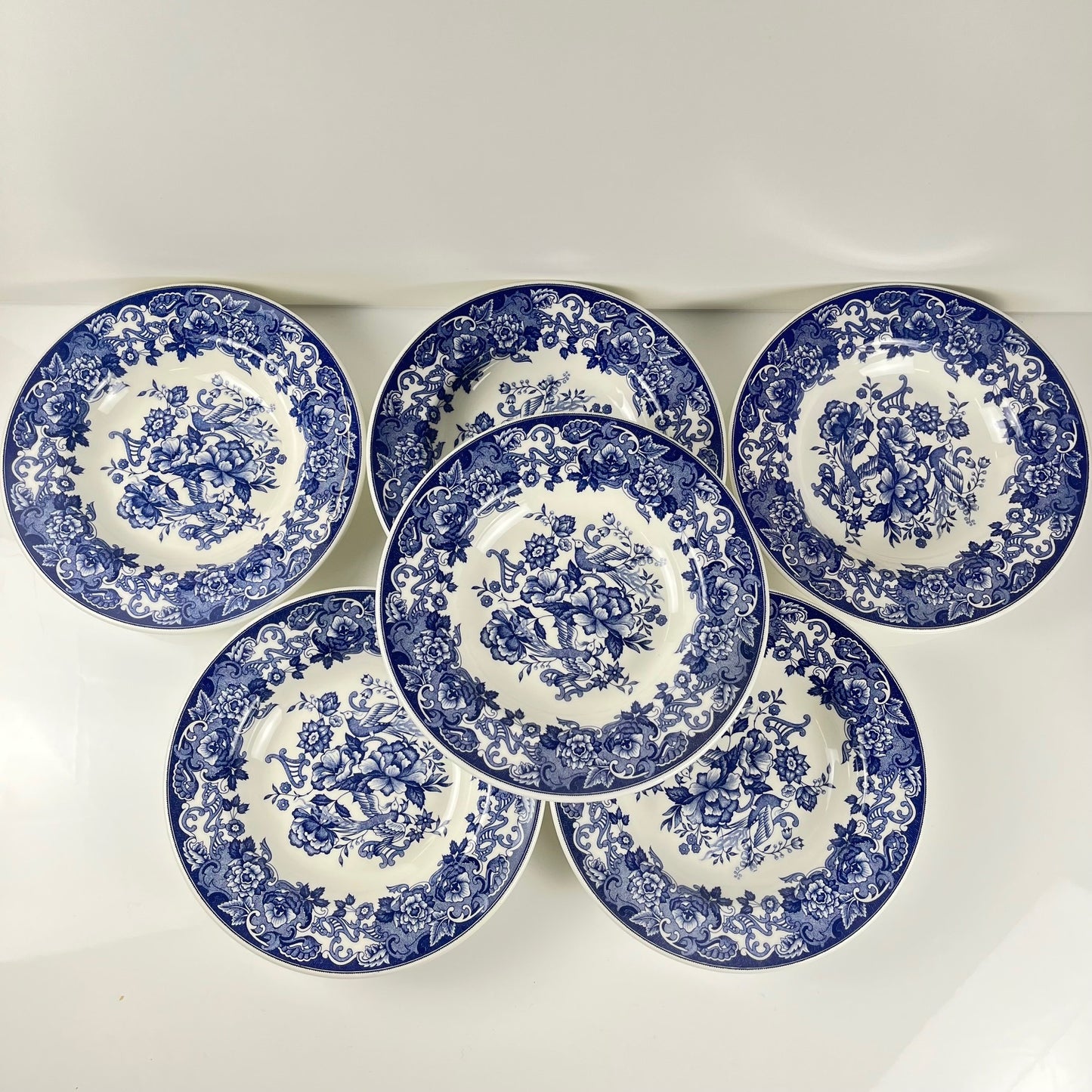 Set of 6 blue earthenware soup plates, floral and bird decoration, early 20th century