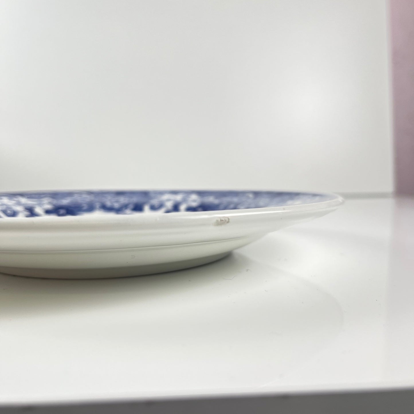 Set of 10 blue earthenware dessert plates with floral and bird decoration, early 20th century