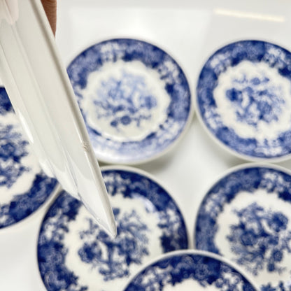 Set of 10 blue earthenware dessert plates with floral and bird decoration, early 20th century