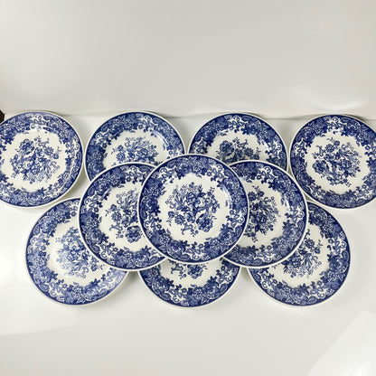Set of 10 blue earthenware dessert plates with floral and bird decoration, early 20th century