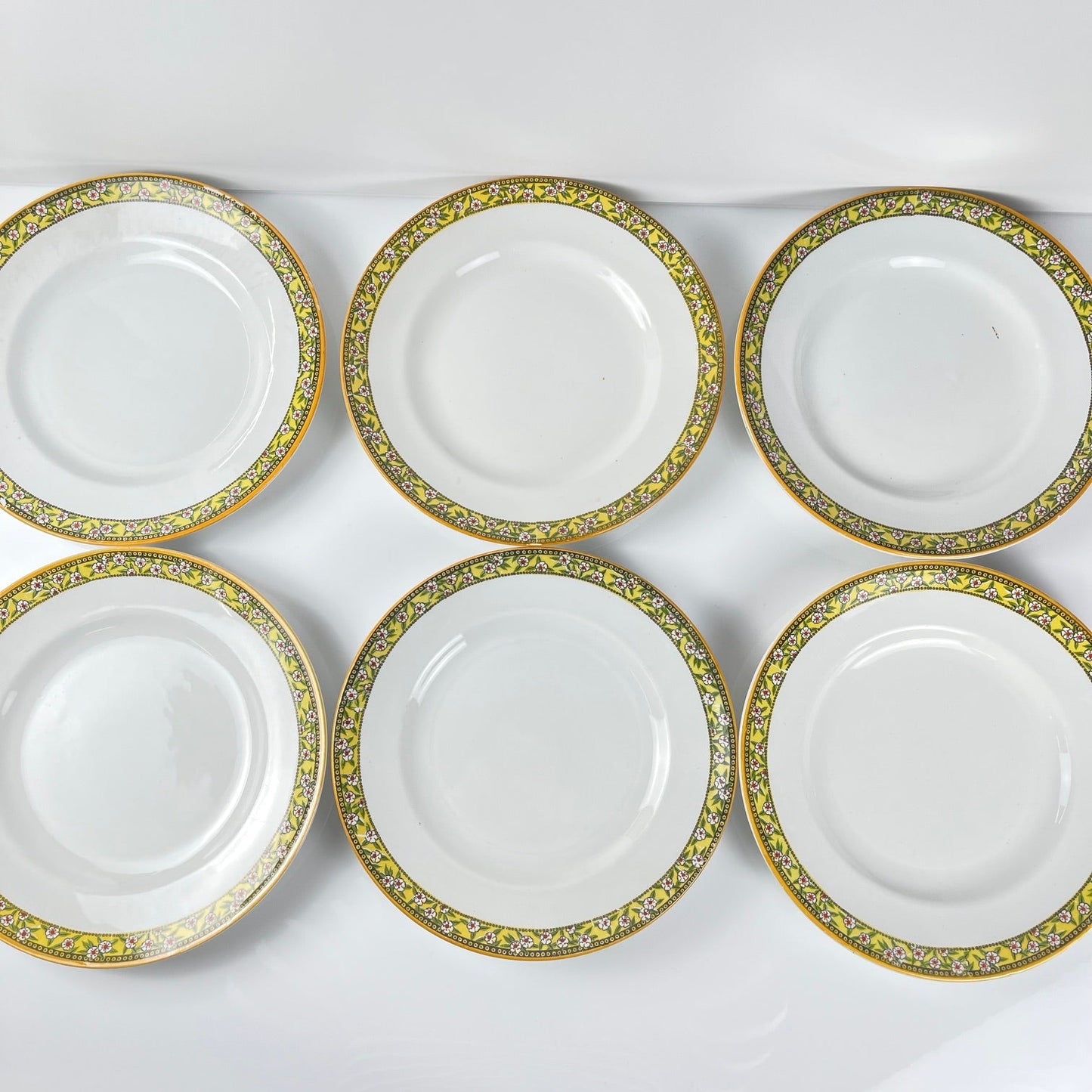 Set of 6 "Yvonne" iron earth plates, Orchies, early 20th century