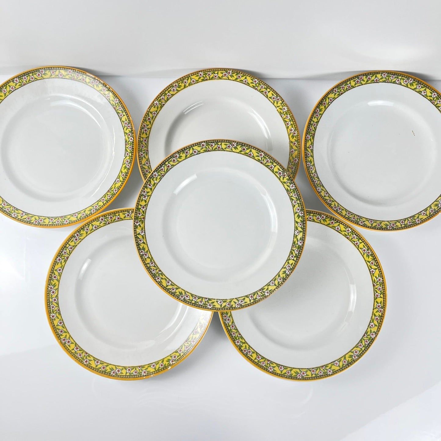 Set of 6 "Yvonne" iron earth plates, Orchies, early 20th century